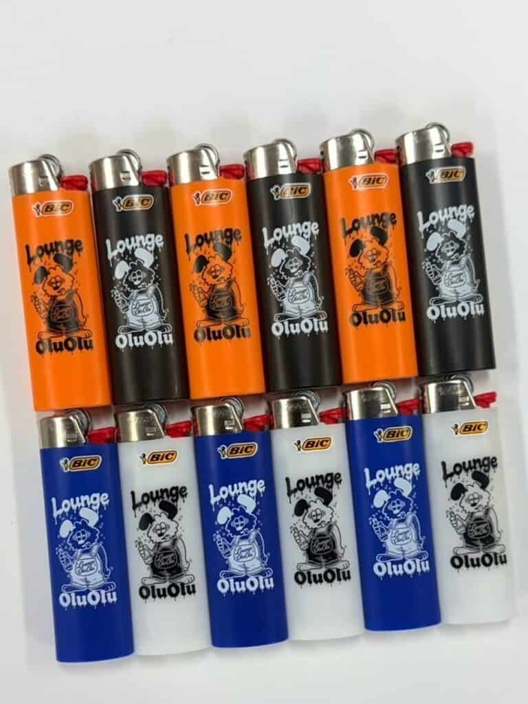 Orange, black, blue and white BIC lighters featuring the same illustrated Lounge design